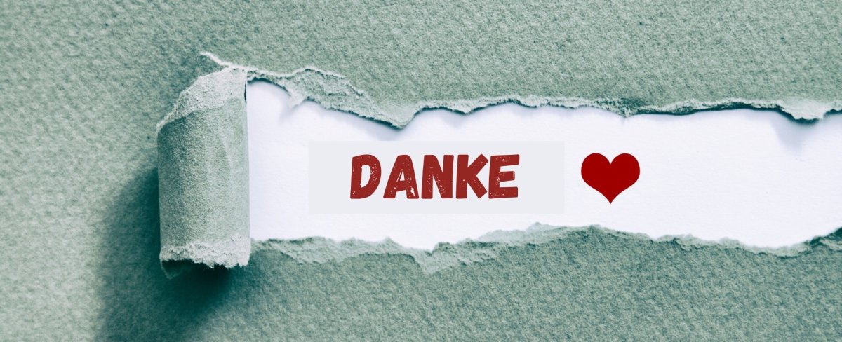Schriftzug Danke und Herz als Symbol